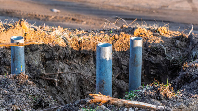Steel foundation pillars in a construction trench