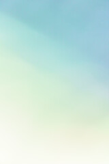 Abstrakcyjne tło z miękkim gradientem w pastelowych odcieniach błękitu i żółci. Delikatna, minimalistyczna tekstura idealna do projektów graficznych, stron internetowych i jako baza pod napisy. © Henryk Niestrój