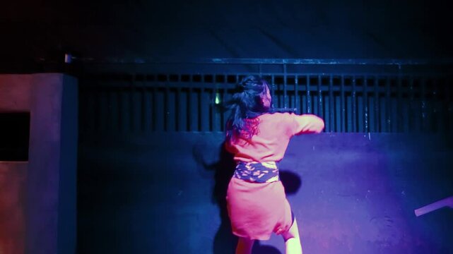 Anguished Contemporary Dance of a Trapped Woman at a Gate