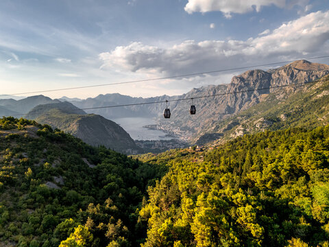 Kotor cable car in Montenegro, drone panorama at sunset with a blut sky