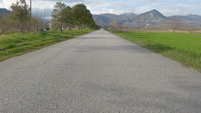 POV driving shot on a rural road through Rocchetta a Volturno plain, Italy.