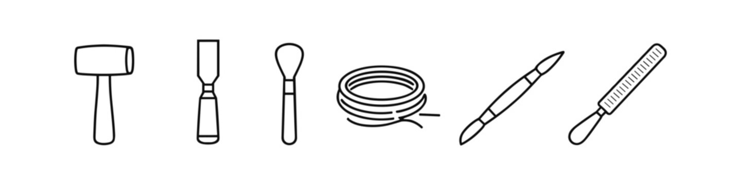 Collection of crafting and sculpting tools for creative projects