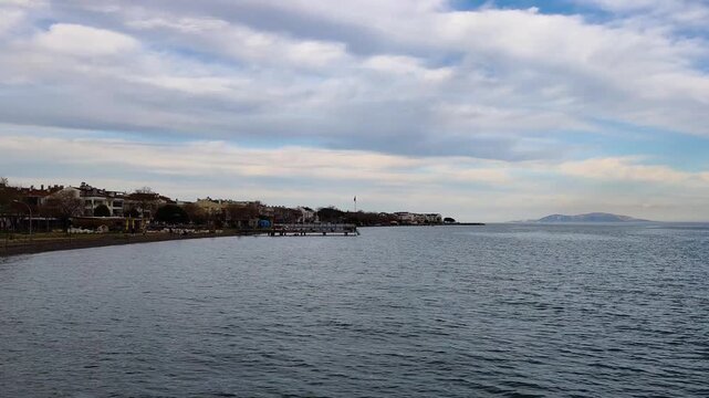Scenic View of the Sarkoy Beach and Coastline with Marmara Island on the Horizon on a Cloudy Day, Sea View from Turkey.