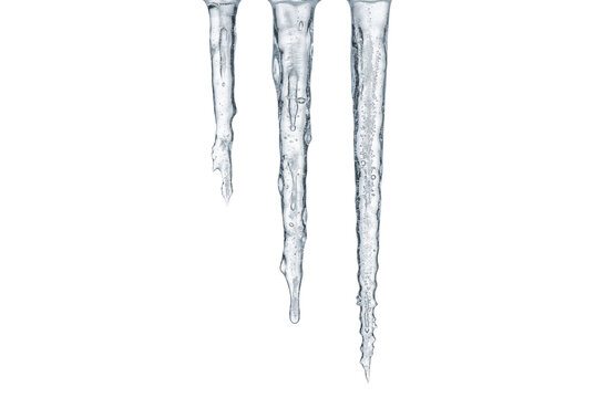 Set of three frozen icicles isolated. Winter season element.