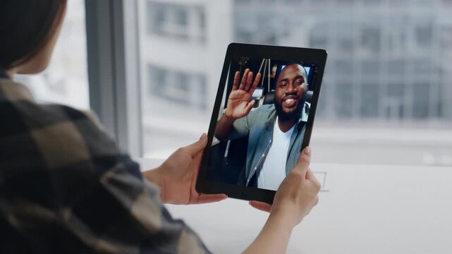 Woman hands tablet video calling office table closeup. Lady holding tab device