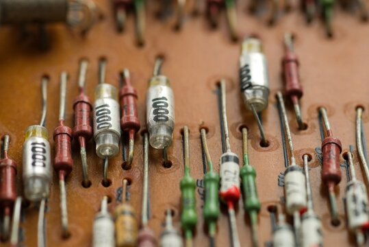 Macro Perspective of Rowed Vintage Resistors and Silver Capacitors