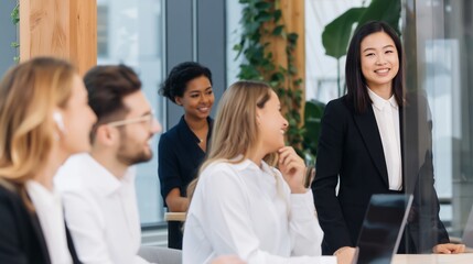 Obraz premium Smiling businesswoman networking at office, professional group, teamwork, modern company, collaboration, positive mood, learning, leadership, unity