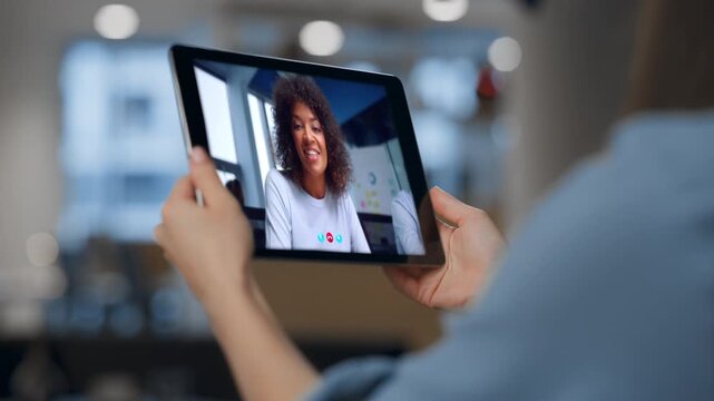 Woman watching video training on pad computer at home close up. Calling online 