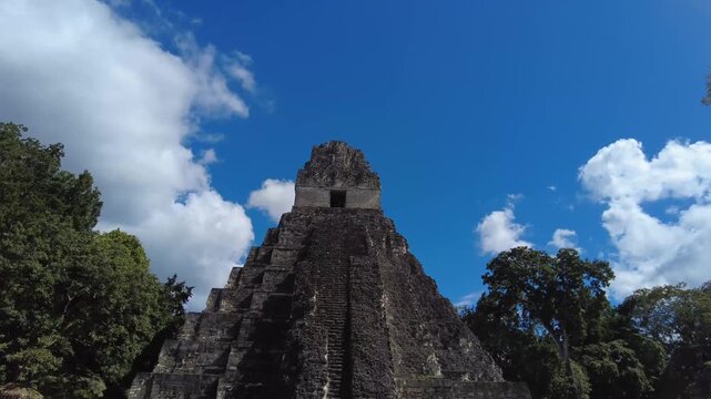 Tikal Mayan Ruins Timelapse with Tourists Exploring Ancient Guatemala Pyramids. Walking and blue sky