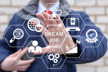 Business person using virtual touch screen sees the text DREAM JOB. Concept of  get your dream job now. Achieving an ideal career aspiration. © wladimir1804