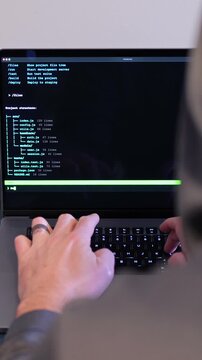 Middle Aged Man Turns Hacker in Hoodie After Using Vibe Coding Command Line Interface Artificial Intelligence Large Language Model Assistant Concept