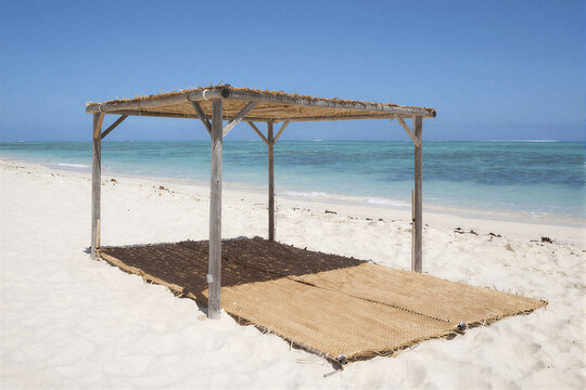 Open-sided Samoan beach fale with woven mats rests on white sand near the ocean