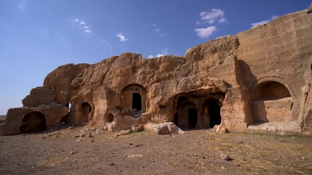 Ruins of rock cut building in Dara ancient city