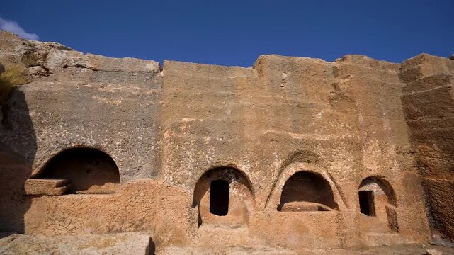 Ruins of rock cut building in Dara ancient city