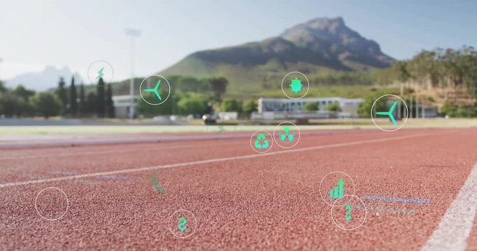 Male teen athlete planting blade on track, activating HUD icons while running for sports metrics