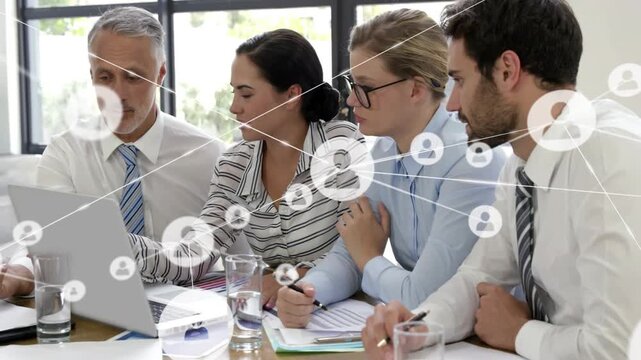 Lead pointing laptop and operator clicking network icons growing into linked nodes showing teamwork