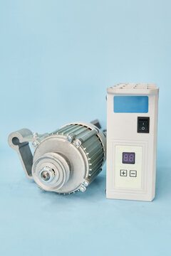 Industrial servo motor and controller for sewing machine