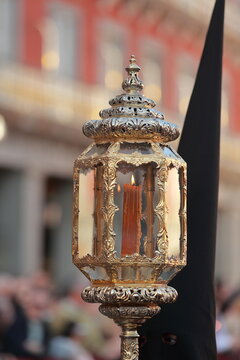Nazareno of Cristo del Gran Poder with ornate lantern on Holy Thursday in Madrid, Spain