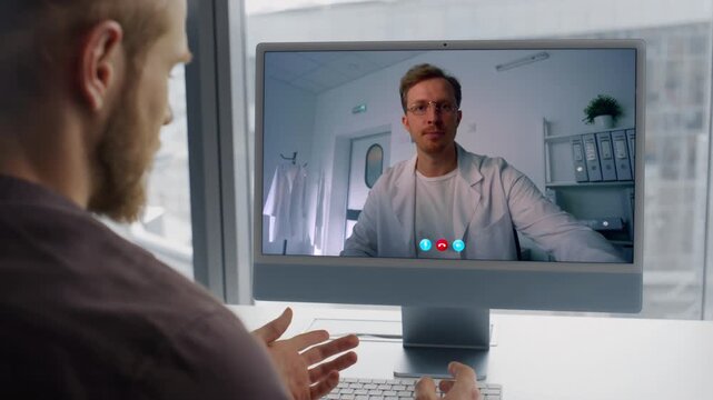 Office man talking videoconference computer workplace closeup. Employee calling