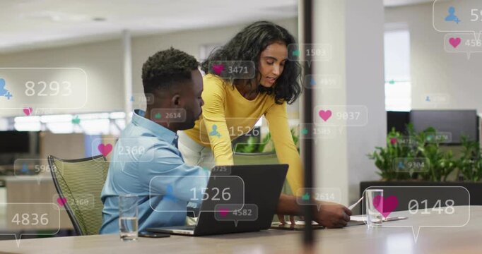 Woman leaning over table placing phone and tapping, causing hearts and counts for ads, man watching
