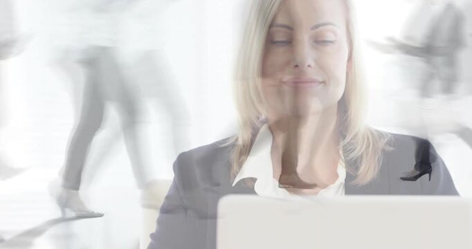 Vertical video: Crossfading woman at desk in business legs circling laptop raising head centering