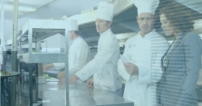 3 chefs placing plates at restaurant metal pass supervisor pointing order slip confirming orders
