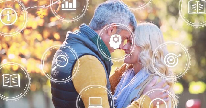 Man holding woman touching foreheads in sunny park, icons appearing and drifting, showing learning