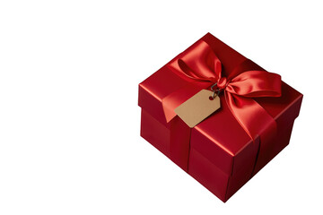 Obraz premium Red gift box with satin ribbon and blank tag, celebrating christmas, valentine's day, anniversaries