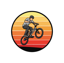 Fototapeta premium Bmx rider performing stunt against sunset background