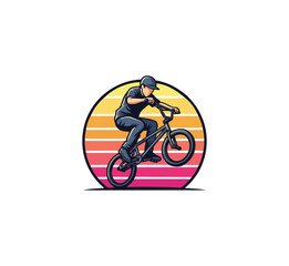 Fototapeta premium Bmx rider silhouette performing wheelie against sunset circle