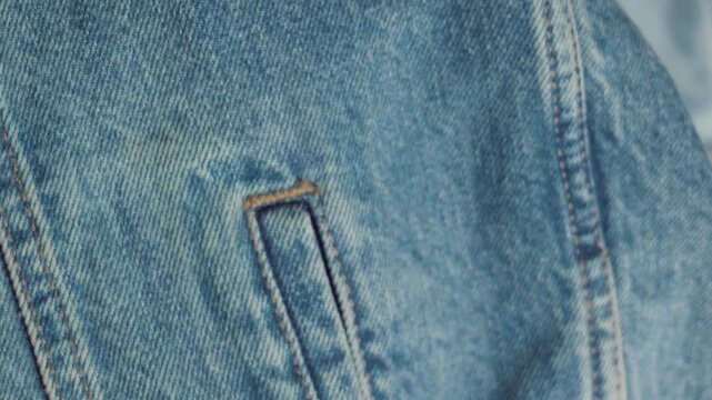 Close Up of Blue Denim Jacket Texture and Seams