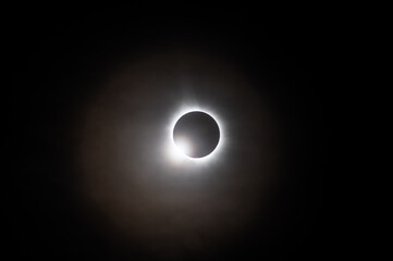 Obraz premium Solar eclipse diamond ring effect with bright flare and corona