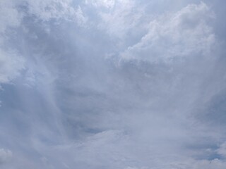 Fototapeta premium Soft Blue Sky with Wispy White Clouds Background