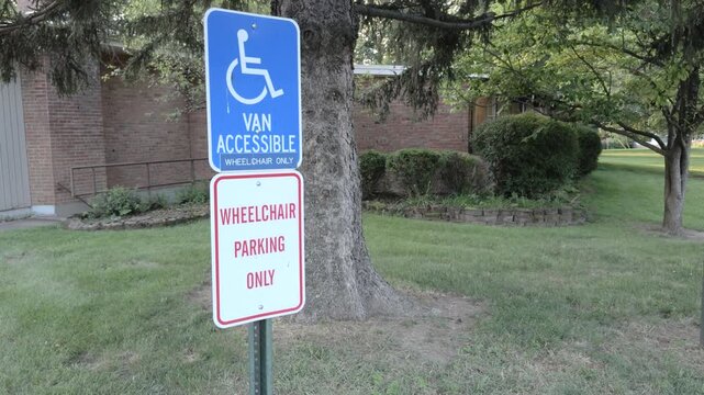 Wheelchair parking only sign in lot 4k
