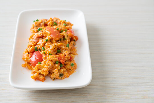 Stir-fried tomatoes with egg or Scrambled eggs with tomatoes