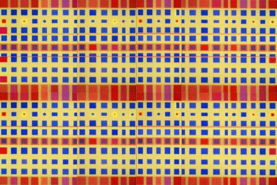 a purple and yellow geometric pattern on a black background