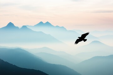 Fototapeta premium Bird silhouette soaring across a serene mountain landscape, symbolizing freedom, peace, and new beginnings at dawn