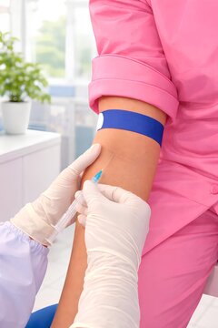 Close Up Blood Test Procedure in Clinic, Healthcare Worker Drawing Blood from Patient Arm with Syringe. median cubital vein, phlebotomy. for healthcare, medical services, laboratory testing concept