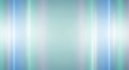 Soft colorful light streaks forming a symmetrical abstract background in blue and green hues. © Farhan khan