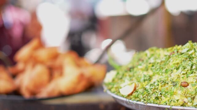 Indian Breakfast Dish with Poha and Samosa Snack