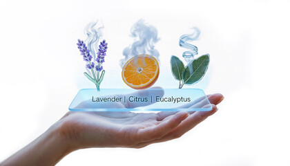 A hand holding an ultra-thin glass tablet projecting 3D aromatherapy vapor and essential oil icons.