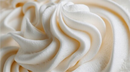 Obraz premium Creamy Swirls of Whipped Topping on a Smooth Surface