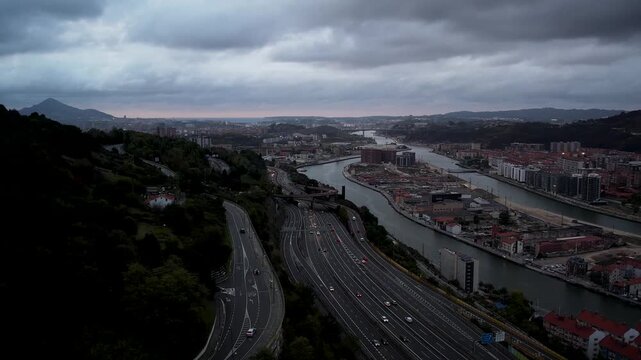 Aerial footage of Nervion river nearby Bilbao in the Basque Country. High quality 4k drone footage