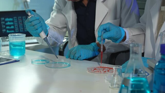 Lab work, Doctor holds a test tube takes the test from a test tube in analysis, blood, DNA, test tube stand.