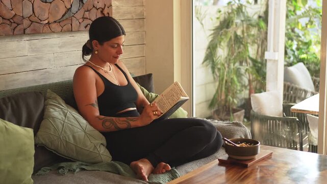 4k video of a Female Yogi Writing in Journal at Cozy Cafe &ndash; Mindful Reflection and Wellness Lifestyle