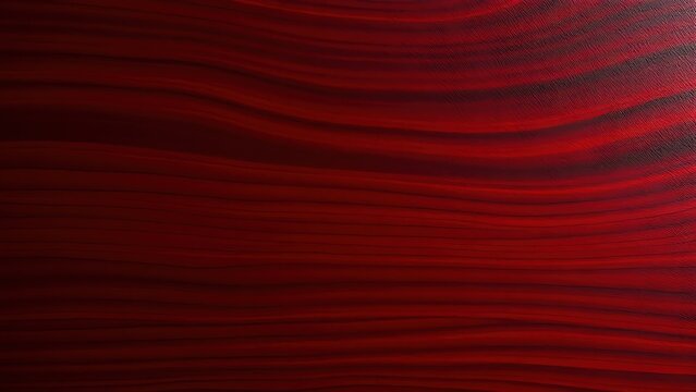  A smooth fragment of deep red padauk wood with intricate dark grain lines.