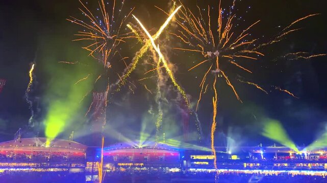 fireworks, colourful fire works lighting the night skies with vivid multi colours glowing colours of Easter Show of the fireworks producing beautiful lighting rainbow colourful effects Sydney NSW Aust