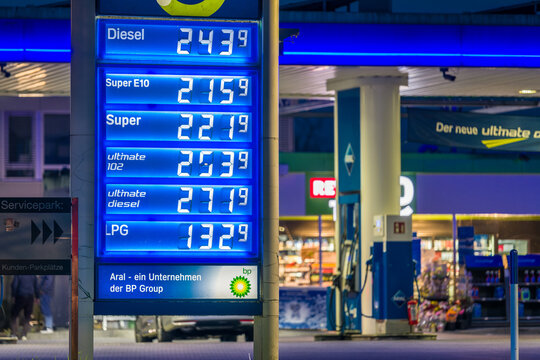 Regensburg, Bavaria, Germany, April 03, 2026, Aral gas station with illuminated fuel price display at dusk, Germany