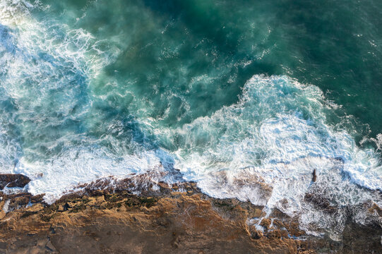 Rocky shoreline top down aerial view