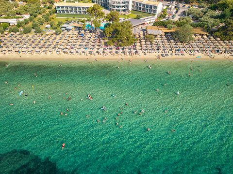 Crowded Sandy Shore of Paralia Pachi Beach, Thasos, Greece